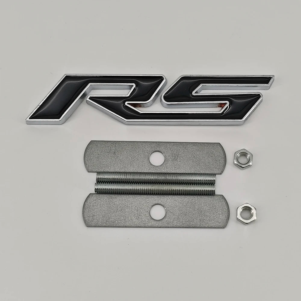 A silver and black RS emblem badge and two stainless steel bolts are displayed on a light gray background.