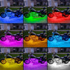 Various motorcycles illuminated by colorful RGB LED atmosphere lights