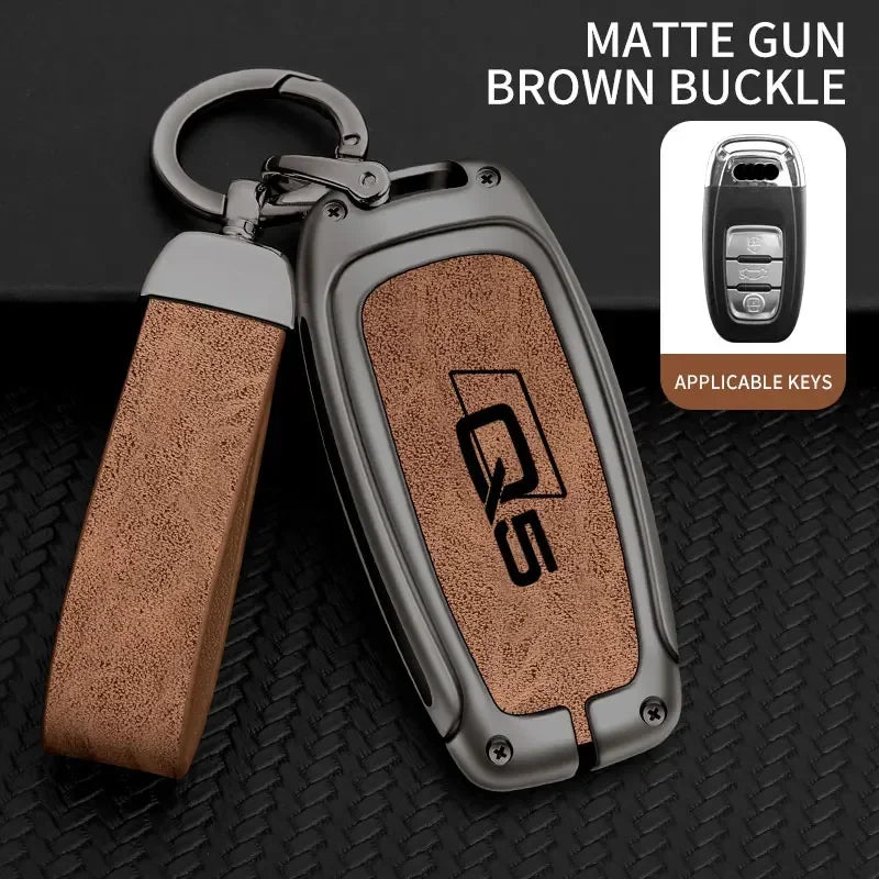 A matte gun brown buckle key fob cover made of zinc alloy with an Audi Q5 key inside.