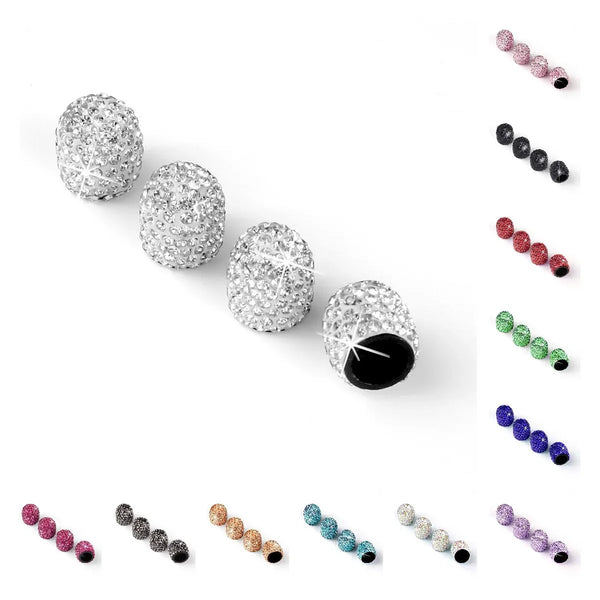 A collection of various diamond-encrusted car wheel valve caps in different colors and styles.