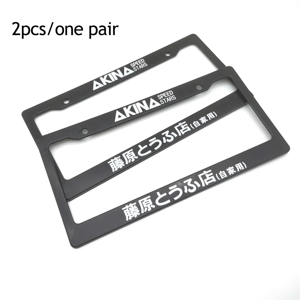 Two black AKINA Speed Stars license plate frames for decoration