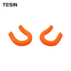 Two orange universal car exterior bumper tow hook covers.