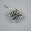 A square metal keychain featuring twelve blue LED lights arranged in a grid.