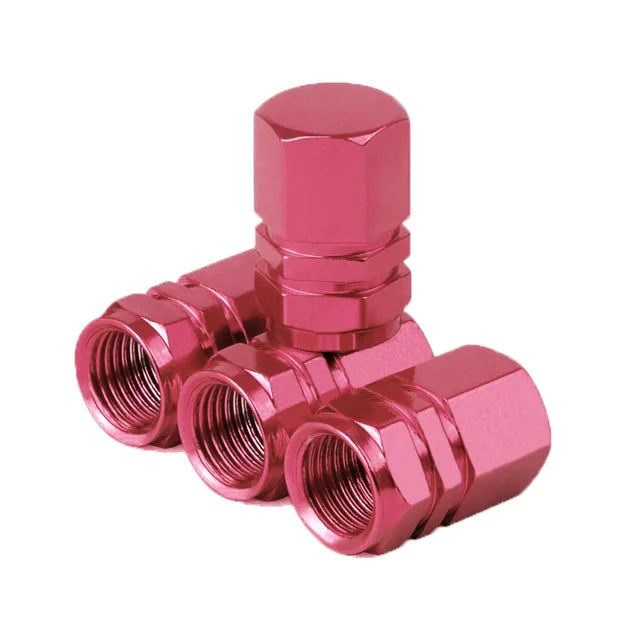 A set of four shiny pink hexagonal aluminum alloy tire valve caps.
