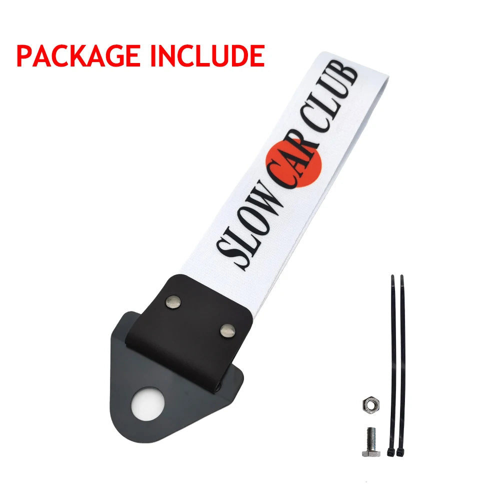 A package including a Slow Car Club tow strap, mounting plate, and bolts.