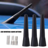 Black universal radio antenna components including a main antenna and several conical tips.