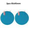 Two circular blue anti-fog and rainproof car mirror protection films, 95x95mm each.