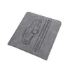 A gray leather document holder featuring a line drawing of a car and the text REGISTRATION & INSURANCE.