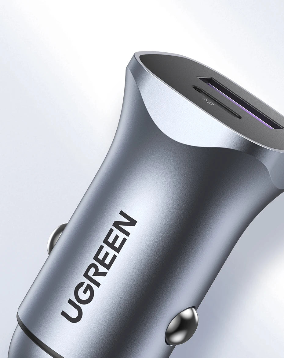 Silver UGREEN 30W Dual-Port USB-C fast car charger with a sleek, modern design.