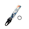 A lanyard featuring a blue and white floral pattern with an orange accent, attached to a black keychain ring.