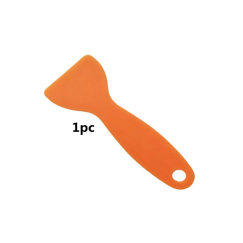 An orange anti-fog and rainproof car mirror protection film.