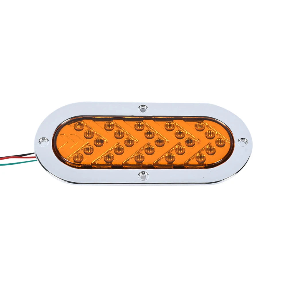 LED tail light assembly with clear orange lens and chrome housing