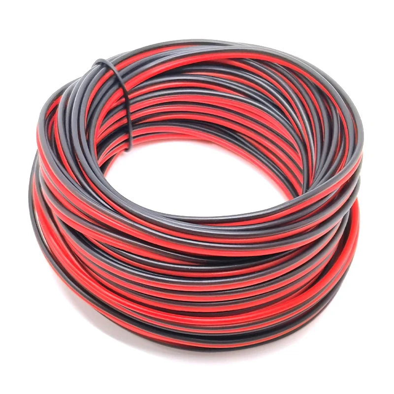 A coil of red and black high flexibility LED power cord wire.