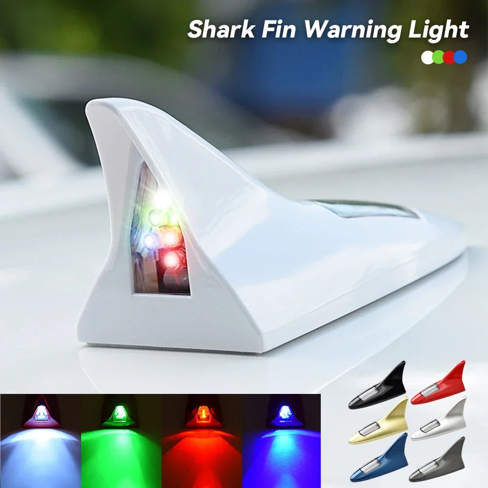A white shark fin warning light device is shown with various colored LED lights displayed below.