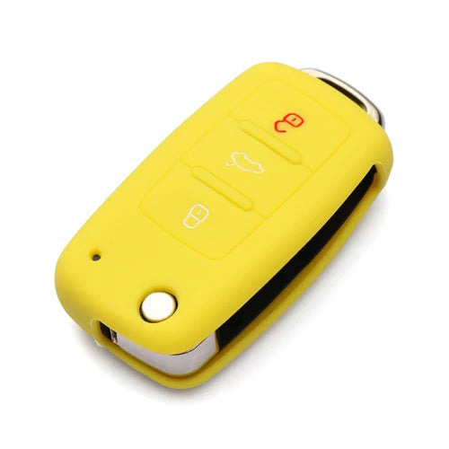 Yellow silicone car key cover for Volkswagen models with a sliding mechanism.