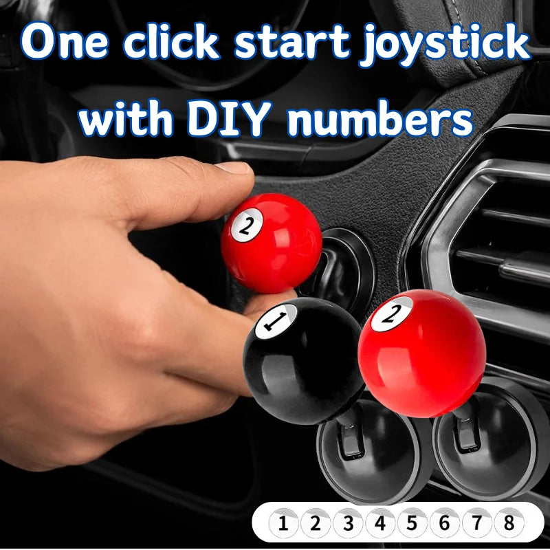 A hand is shown inserting numbered red and black balls into a car start button joystick mechanism.