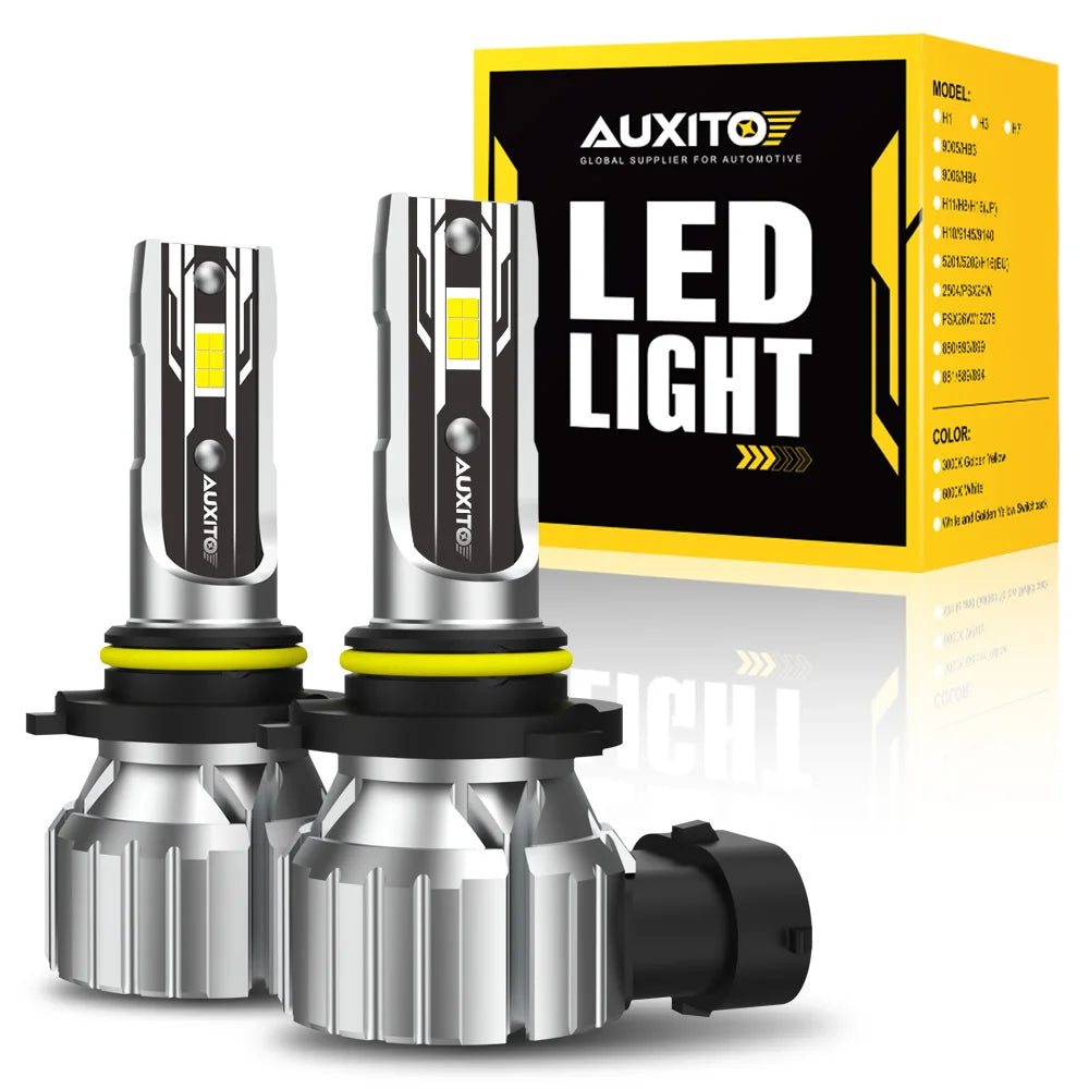 A product box and two LED light bulbs for automotive use, featuring a bright yellow LED light.
