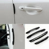 A close-up view of a white car door edge protector strip and four black anti-scratch guard trim pieces.