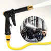 A black high-pressure cleaning gun with a yellow hose is shown next to a motorcycle.