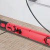 Red magnetic rechargeable work light with a Type-C charging interface shown next to a laptop and power bank.
