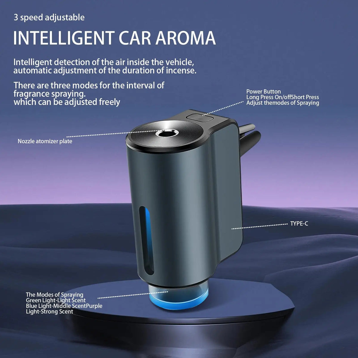 A dark gray portable car air freshener device with a nozzle, resting on a dark surface.