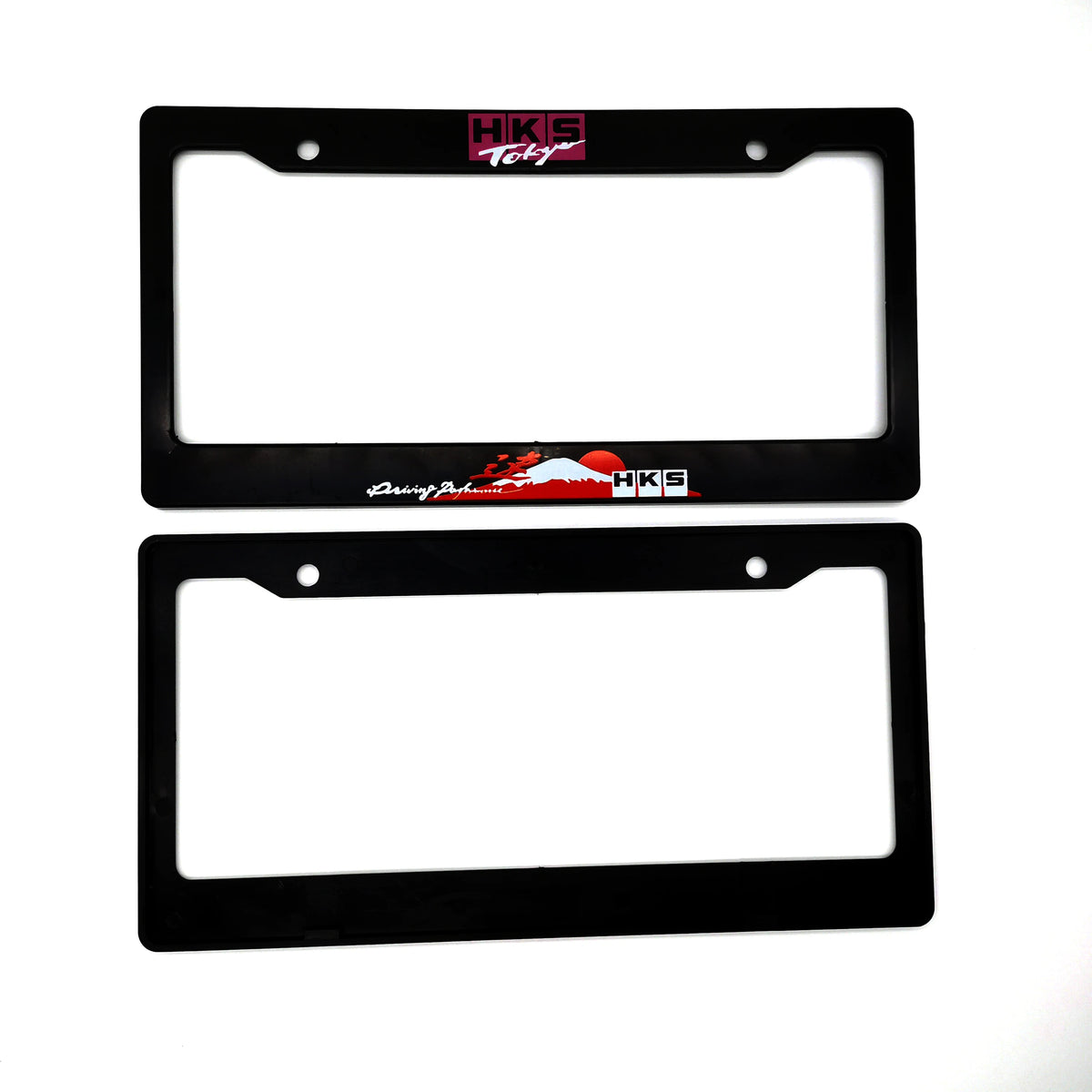 Black license plate frame decoration with an HKS logo and a stylized mountain graphic.