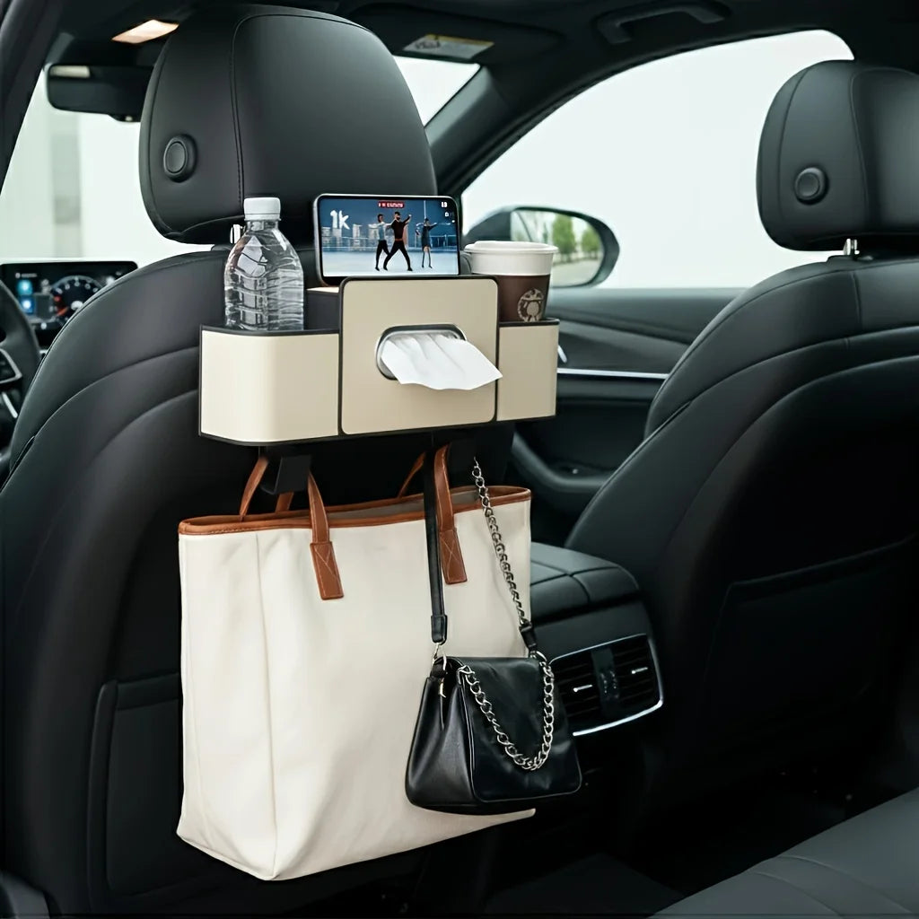 A car seat back organizer storage box with a cup holder, sunglasses, and a tote bag visible in the interior of a car.