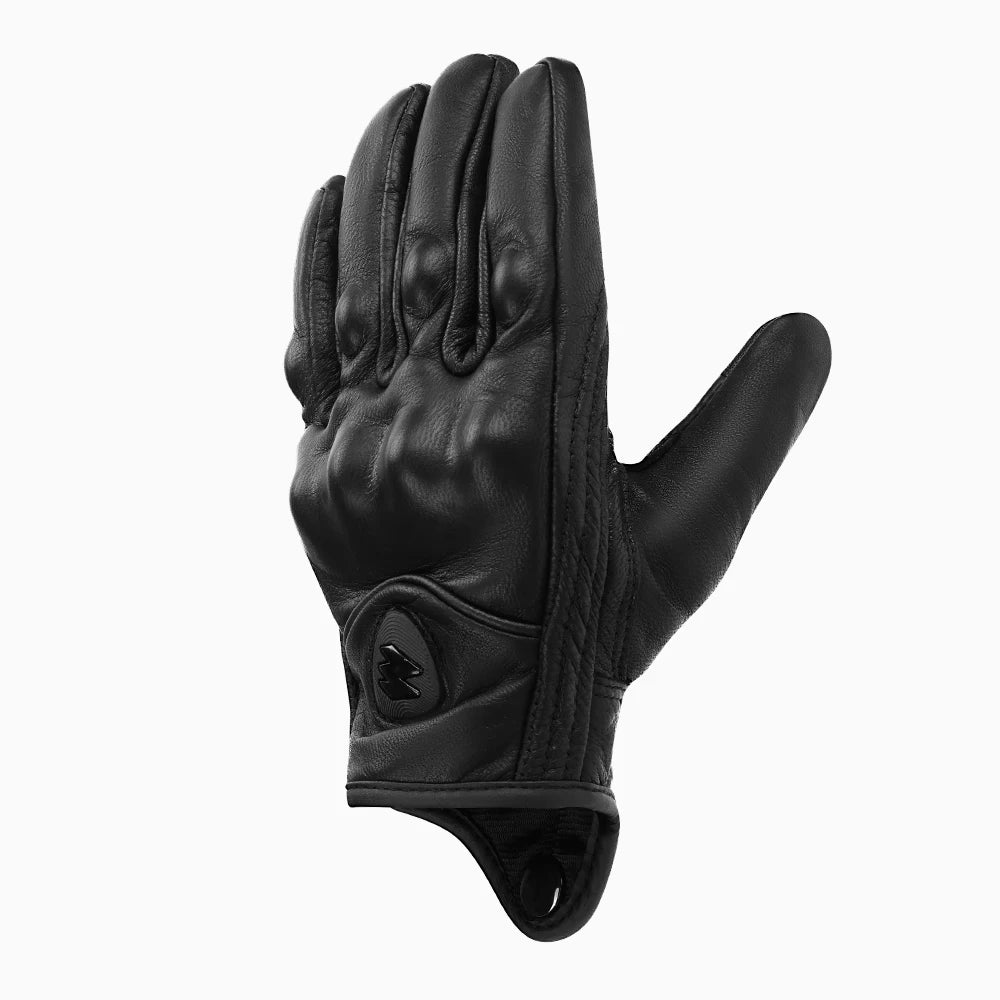 A close-up view of black leather motorcycle and cycling gloves.