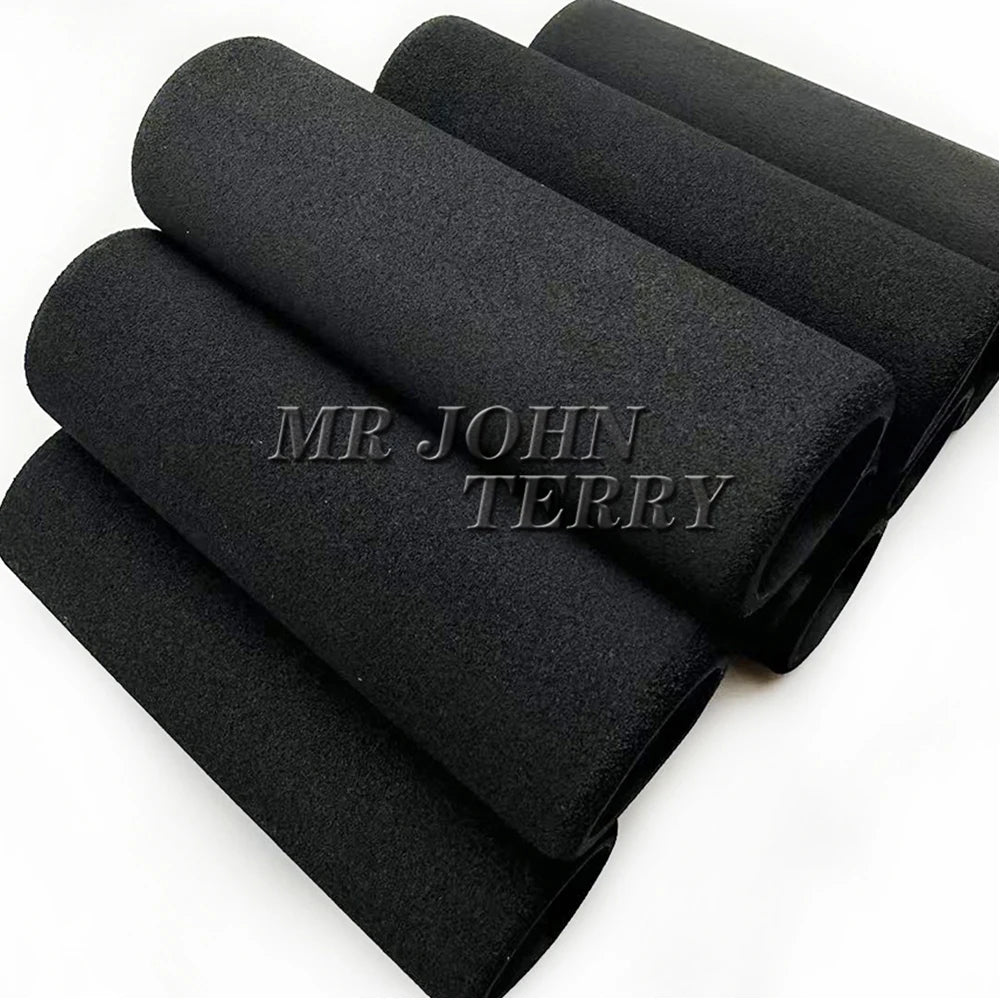 Black motorcycle handlebar grip covers stacked and displayed.