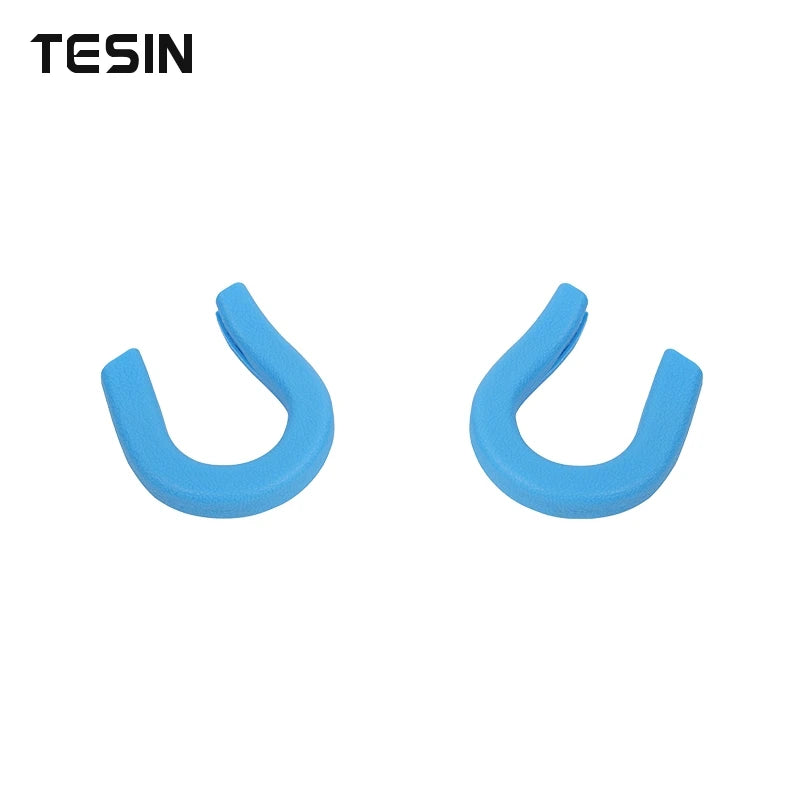 A pair of light blue universal car exterior bumper tow hook covers.
