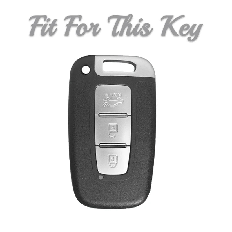 A black universal car key case cover with a silver key inside.