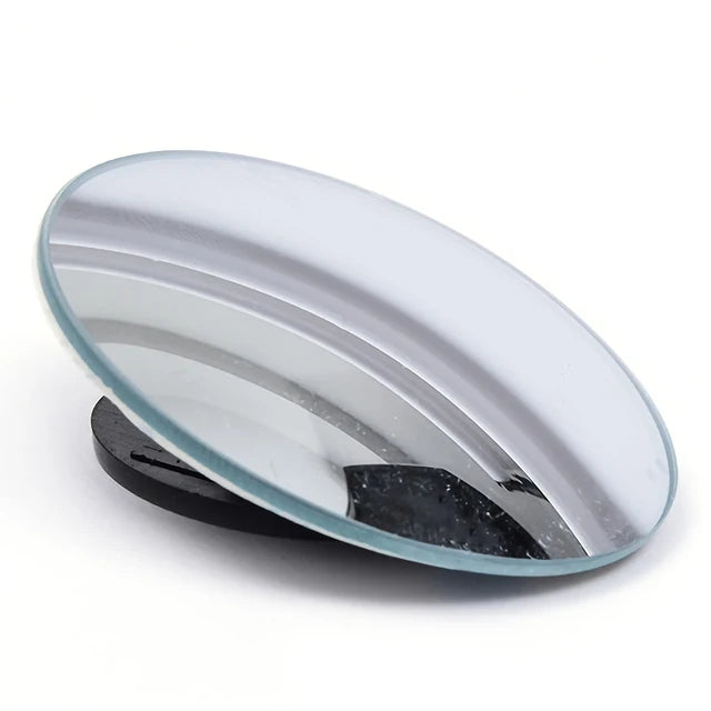 A round, reflective rearview mirror with a clear protective lens and a black housing.