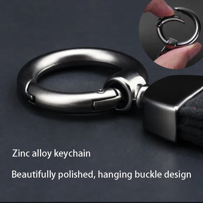 A close-up of a beautifully polished zinc alloy keychain with a hanging buckle design.