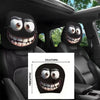 Black horror themed car headrest covers installed in a vehicle interior.