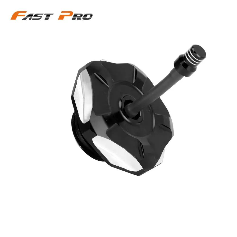 Black and silver aluminum fuel tank cap cover for Honda CRF 110/125 motorcycle.