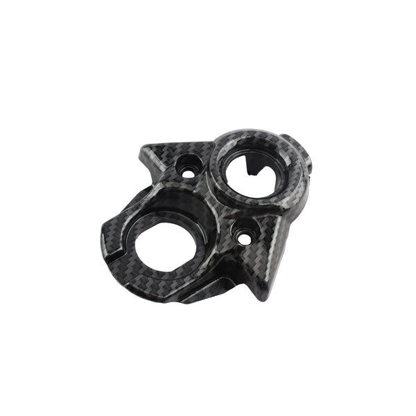 Black carbon fiber body kit for dirt bikes featuring mounting holes and a circular cutout.