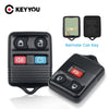 A black universal remote car key transmitter with multiple buttons and a separate remote key shown next to it.