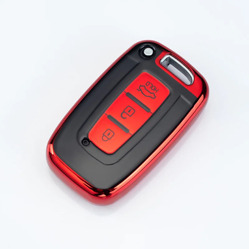 A red and black universal car key case cover with multiple key slots and a silver release button.