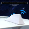 A white shark fin antenna made of ABS material and copper, shown emitting a radio signal against a dark starry background.