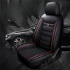 Black PU leather car seat covers installed on a dark SUV interior.