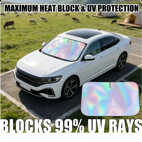 A white car with a transparent UV reflective tint on the windshield and side windows.