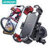 A black universal bike phone mount is shown next to a smartphone displaying a mountain biker.