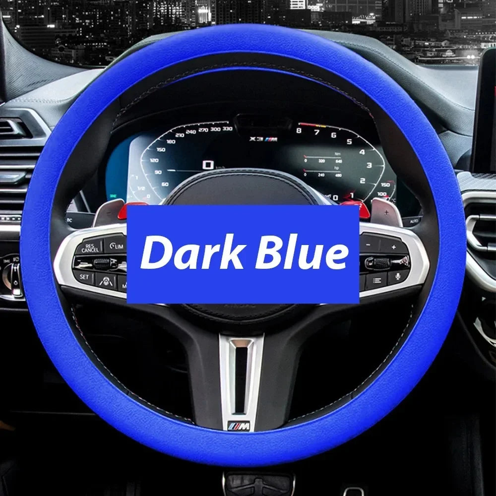 A dark blue silicone steering wheel cover is shown inside a car, featuring an illuminated display and leather grip.