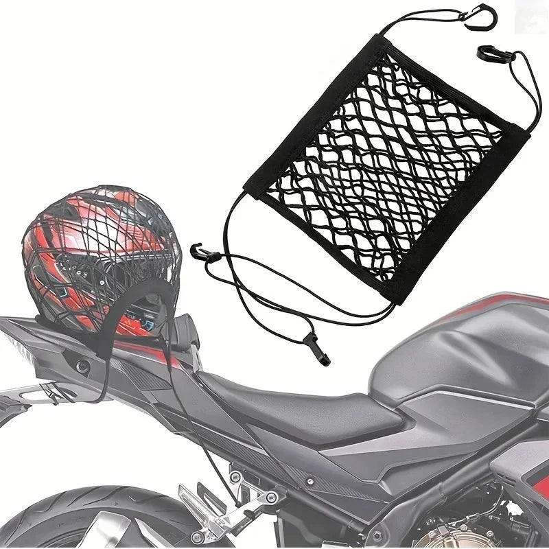 A black cargo net with hooks is shown attached to a motorcycle, designed for securing cargo.
