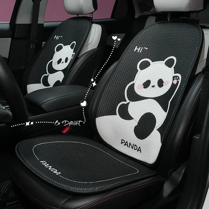 Black car seat cushion with a white panda design and the word Panda on the seat.