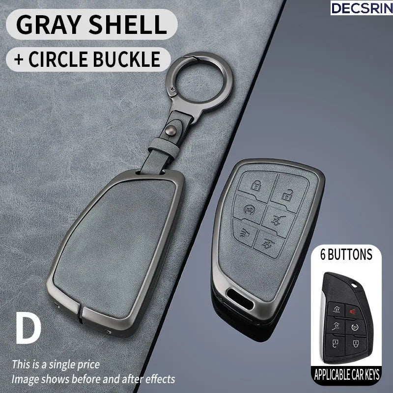 Gray shell car key case with a circle buckle and 6 buttons shown on a dark surface.