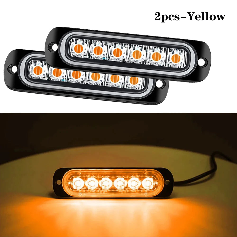 Deux gyrophares d'avertissement jaunes doubles pour véhicule, un en forme d'emballage et l'autre illuminé.