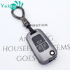 A dark gray universal car key cover with a metal hook, designed for Chevrolet, Buick, Opel, Astra, and similar vehicles.