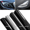 Rolls of universal car light tint film in deep black, transparent, matt black, and light black colors.