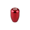 A glossy red universal aluminum gear shift knob for manual transmissions.